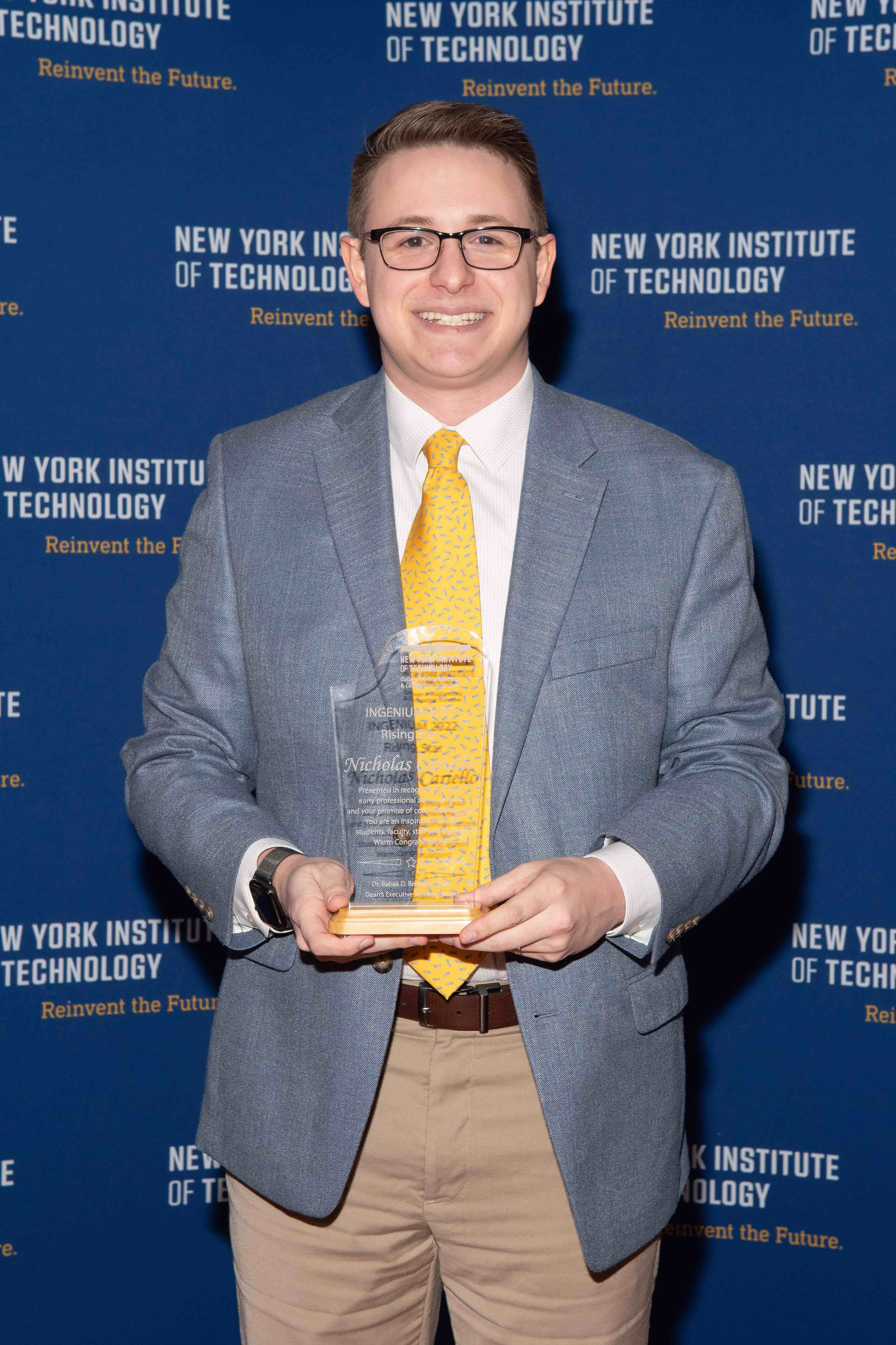 Nicholas Cariello receiving the Ingenium Rising Star Award at New York Institute of Technology